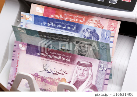 Jordanian dinar in the counting machine Jordanian dinar in the counting machine 116631406
