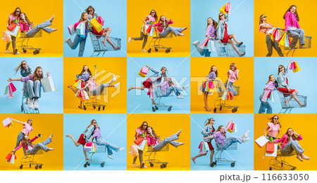 Happy and excited young women on shopping trolleys with many colorful shopping bag. Big sales, shopaholic emotions Happy and excited young women on shopping trolleys with many colorful shopping bag. Big sales, shopaholic emotions 116633050