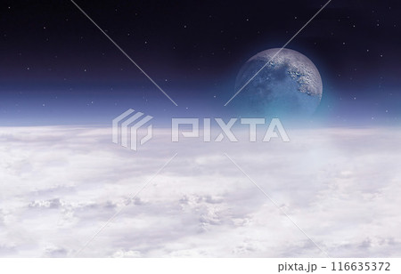 The moon is above the horizon and a layer of clouds on a background of stars 116635372
