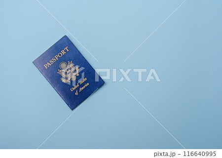 United states of america passport on a blue background United states of america passport on a blue background 116640995