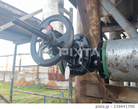 Old black pipeline valve 116641700