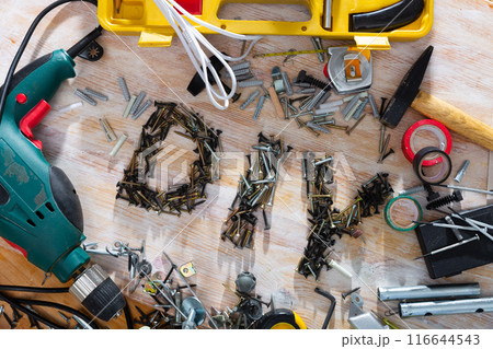 Image of hand tools for repairing on wooden surface 116644543