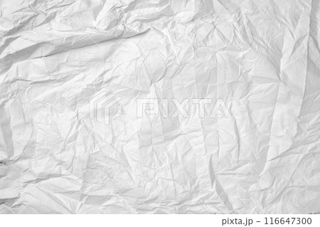 A white background with a paper that is torn and crumpled A white background with a paper that is torn and crumpled 116647300