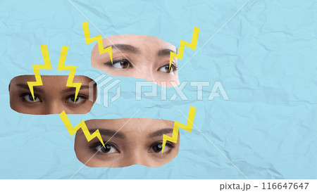 Three women's eyes are shown with yellow lightning bolts surrounding them 116647647