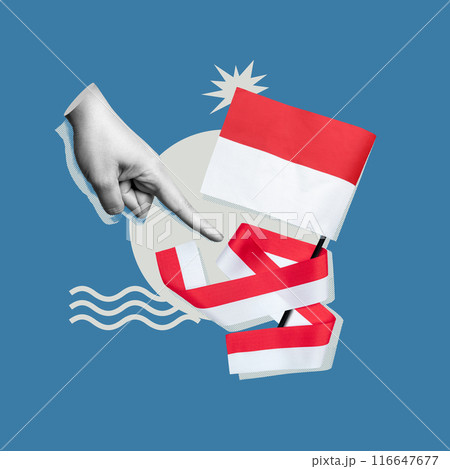 Human hand pointing to an Indonesian flag 116647677
