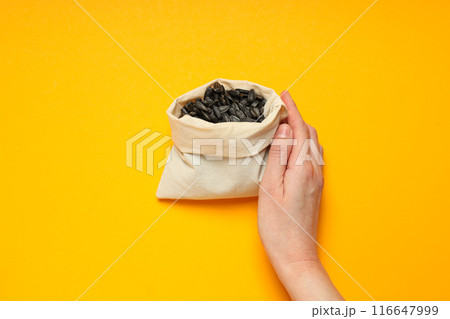 Sunflower seeds, concept of tasty snack, concept of harvest Sunflower seeds, concept of tasty snack, concept of harvest 116647999