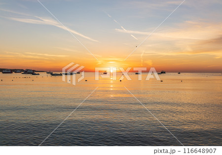 Sunrise over the sea. Panoramic seascape. Sunrise over the sea. Panoramic seascape. 116648907