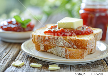 Butter and Jam Toast on a wooden table Butter and Jam Toast on a wooden table 116652010