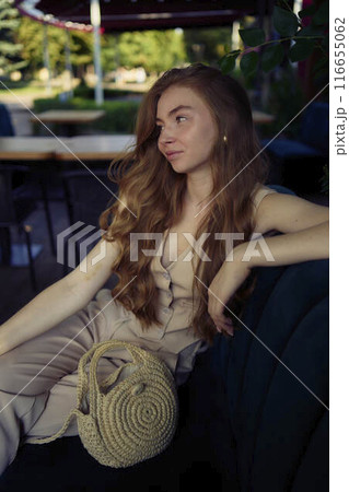 a  beautiful teenage girl in a peach fuzz suit with a vest, in the old money style in a fancy restaurant a  beautiful teenage girl in a peach fuzz suit with a vest, in the old money style in a fancy restaurant 116655062