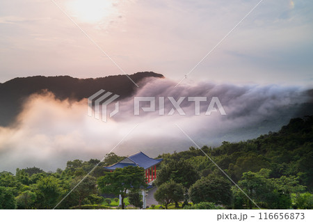 Sky colorful clouds. There is a cloud waterfall on the top of the mountain. 116656873