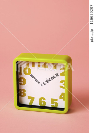 text back to school in french in a clock 116659297