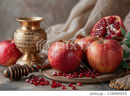 Still life with apples. Rosh Hashanah table bright display apples, honey, pomegranates and shofar 116660850