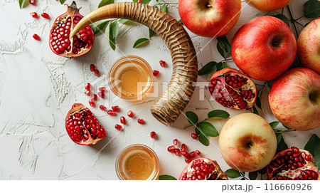Flat lay composition apples, ram's horn, pomegranate, honey jar, honey spoon, Shofar Ram's Horn 116660926