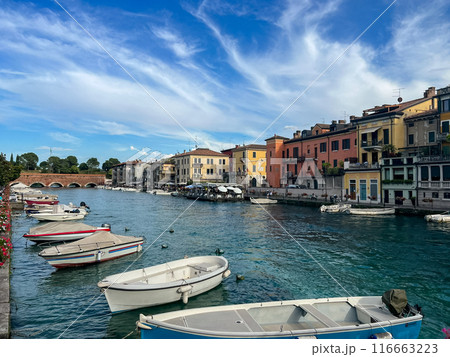 Sunset view of main canal in Italian town Peschiera del Garda. 116663223