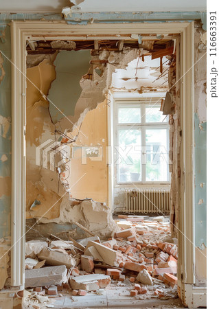 Demolishing a wall to create an open floor plan in home renovation 116663391