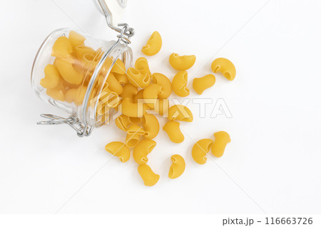 uncooked pipe rigate pasta isolated on white background 116663726