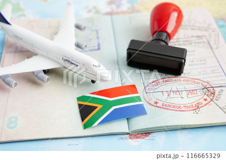 Bangkok, Thailand December 10, 2023 South Africa Visa and passport document to immigration at airport in country. Bangkok, Thailand December 10, 2023 South Africa Visa and passport document to immigration at airport in country. 116665329