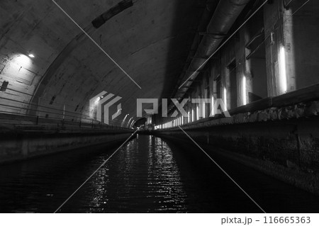 Industrial concrete tunnel. Aandoned underground military base 116665363