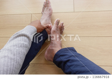 pov shot of young man suffering feet pain pov shot of young man suffering feet pain 116667918