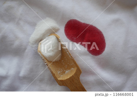 Baking soda and blood stain on a cloth Baking soda and blood stain on a cloth 116668001
