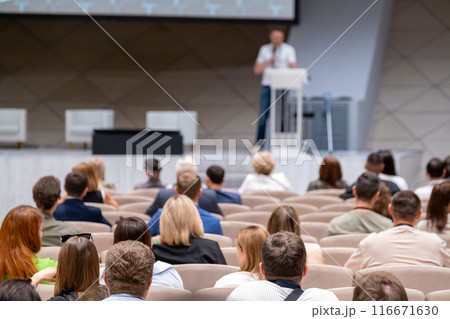 Speakers and audience at a tech conference event 116671630