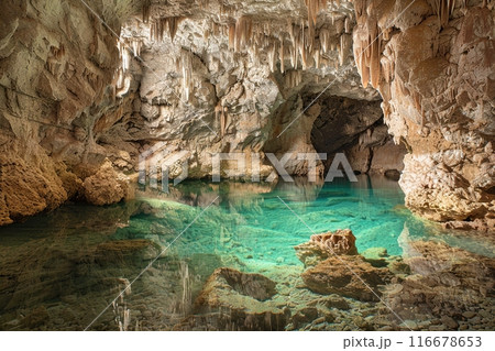 Generative ai on theme of a large beautiful sharp stalactites hanging down from deep mountain cave 116678653