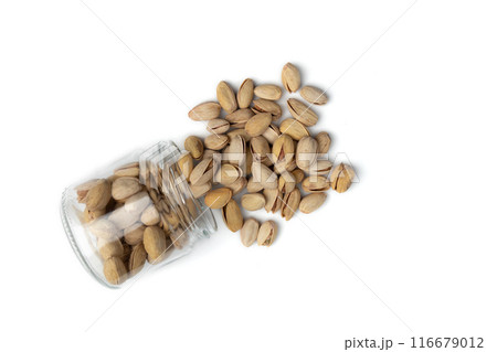 heap of unpeeled pistachio isolated on white background 116679012