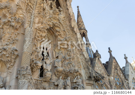 La Sagrada Familia Catalan Cathedral. Vertical view on the biggest cathedral in the world made by famous architecture Antonio Gaudi. Details La Sagrada Familia Catalan Cathedral. Vertical view on the biggest cathedral in the world made by famous architecture Antonio Gaudi. Details 116680144