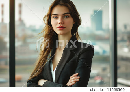 Young business woman set against an urban background. Natural beauty, lifestyles and business. 116683694