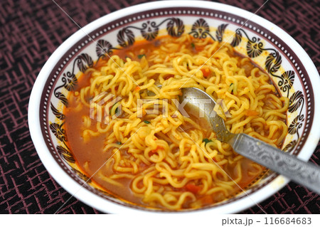 INSTANT READY TO EAT NOODLES AS A BREAKFAST IN HILLY VILLAGE 116684683