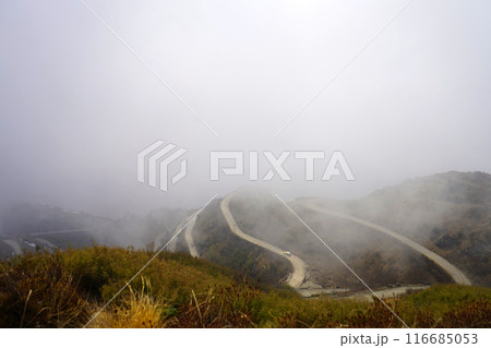 SILK ROUTE ZIG ZAG ROAD IN CLOUDY WEATHER IN SIKKIM 116685053
