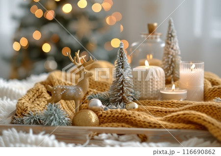 Golden Christmas Decorations With Miniature Tree and Reindeer on Wooden Tray 116690862