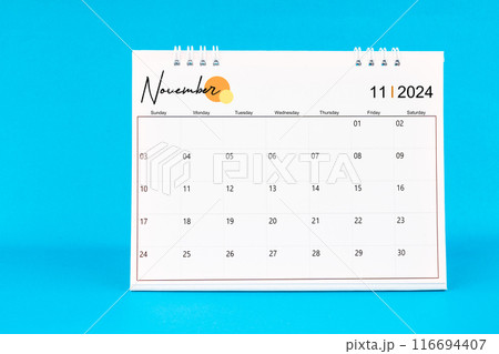 November 2024, Monthly desk calendar for 2024 year on Blue background. November 2024, Monthly desk calendar for 2024 year on Blue background. 116694407