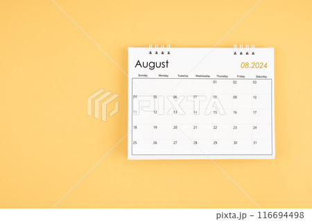 August 2024 desk calendar on yellow color background, position with copy space. 116694498