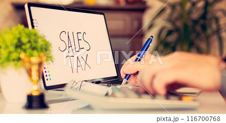 Sales tax note. Business concept of the amount of money a company pays its employees, paying taxes Sales tax note. Business concept of the amount of money a company pays its employees, paying taxes 116700768
