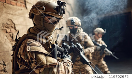Group of special forces soldiers in a warehouse with weapons are preparing for an operation. 116702673