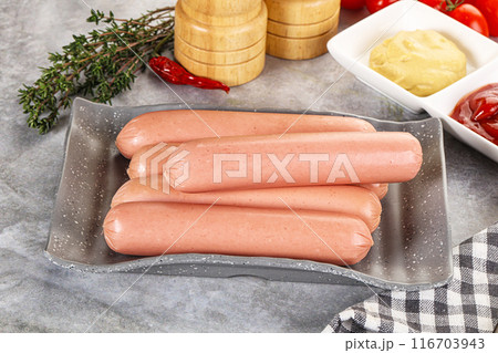 Boiled sausages with ketchup and mustard 116703943