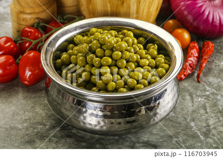 Sweet canned young green peas Sweet canned young green peas 116703945