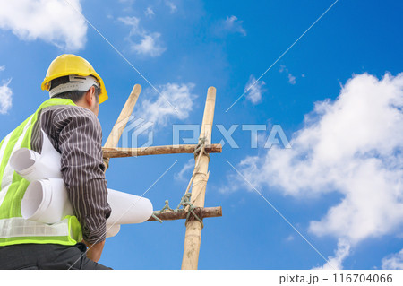 Asian business man engineer climbing up ladder with blue sky, career growth and success concept Asian business man engineer climbing up ladder with blue sky, career growth and success concept 116704066