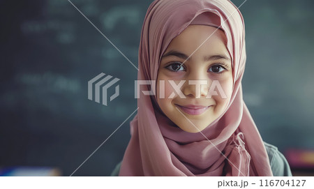 A beacon of inspiration, her hijab empowers her to excel academically. 116704127