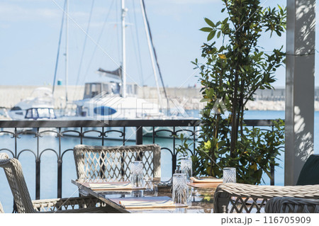 Outdoor Dining Area with Marina View 116705909