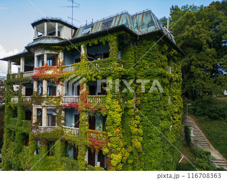 Drone shot flying. Slovenia. Green building. Drone shot flying. Slovenia. Green building. 116708363