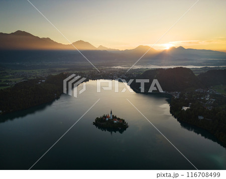 Drone shot flying. Slovenia. Lake Bled. Sunrise. Drone shot flying. Slovenia. Lake Bled. Sunrise. 116708499