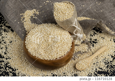 a large amount of quinoa groats during porridge cooking a large amount of quinoa groats during porridge cooking 116710128