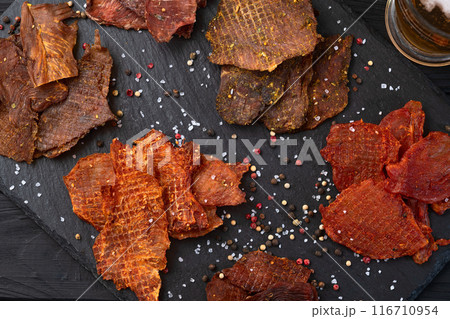 Mix of dried meat Jerky . From chicken , beef and pork. 116710954