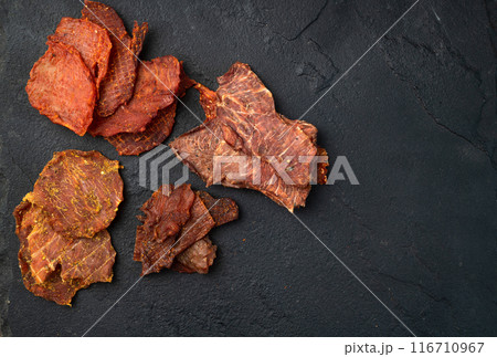 Mix of dried meat Jerky . From chicken , beef and pork. 116710967