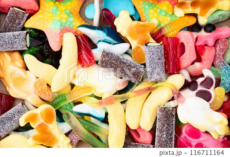 Mix of colorful gummy candies . Sweet dessert 116711164
