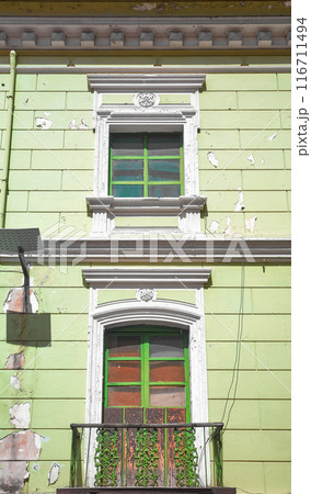 Street view of facade of old colonial building in Quito, Ecuador. Street view of facade of old colonial building in Quito, Ecuador. 116711494