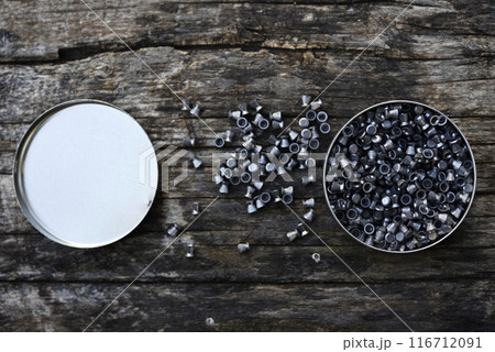 Lead bullets for an air rifle. Bullets for sports weapons. A can of bullets. 116712091
