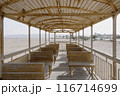 Interior of Abandoned Wooden Train Carriage in Desert 116714699